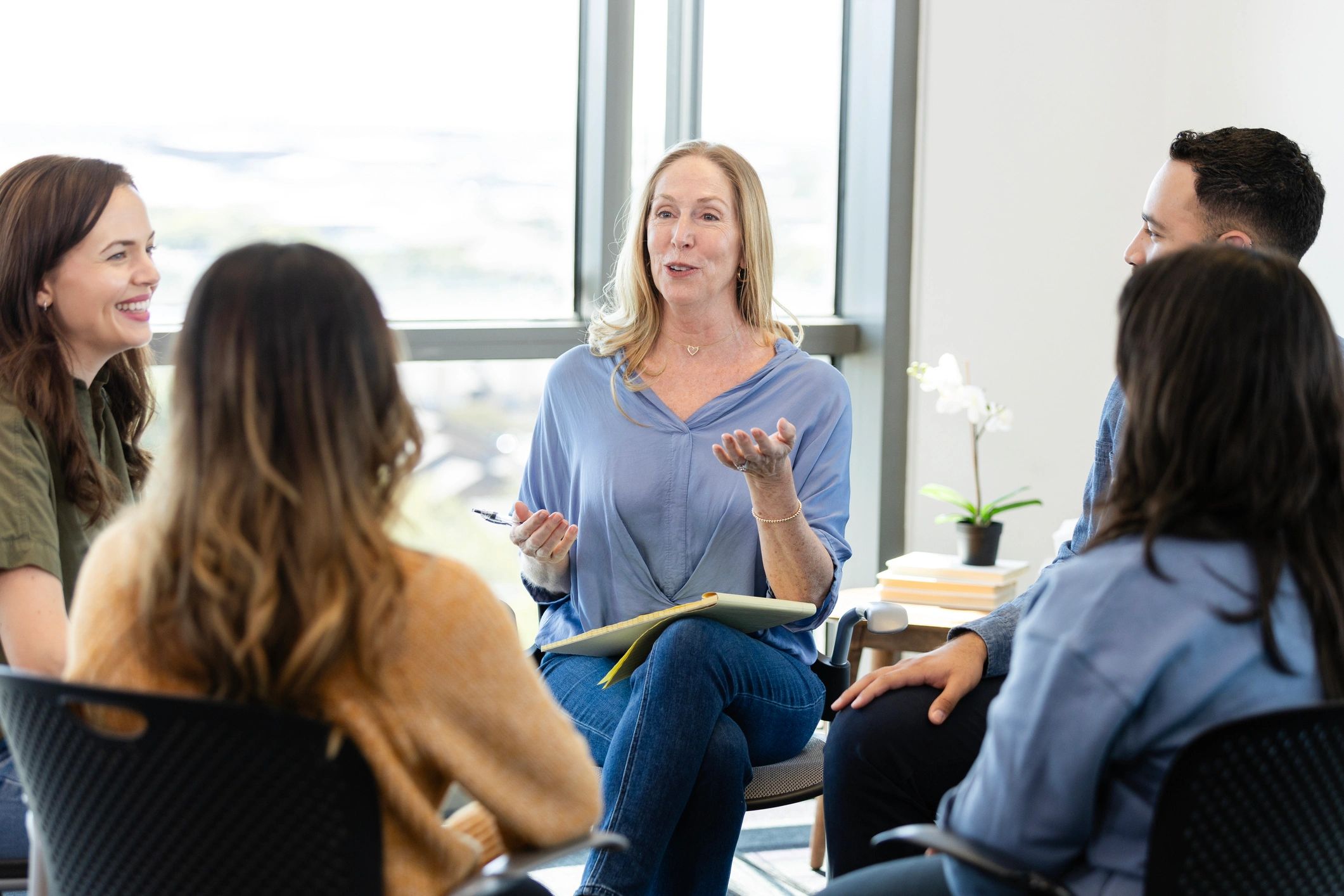 Adults in a supportive group conversation