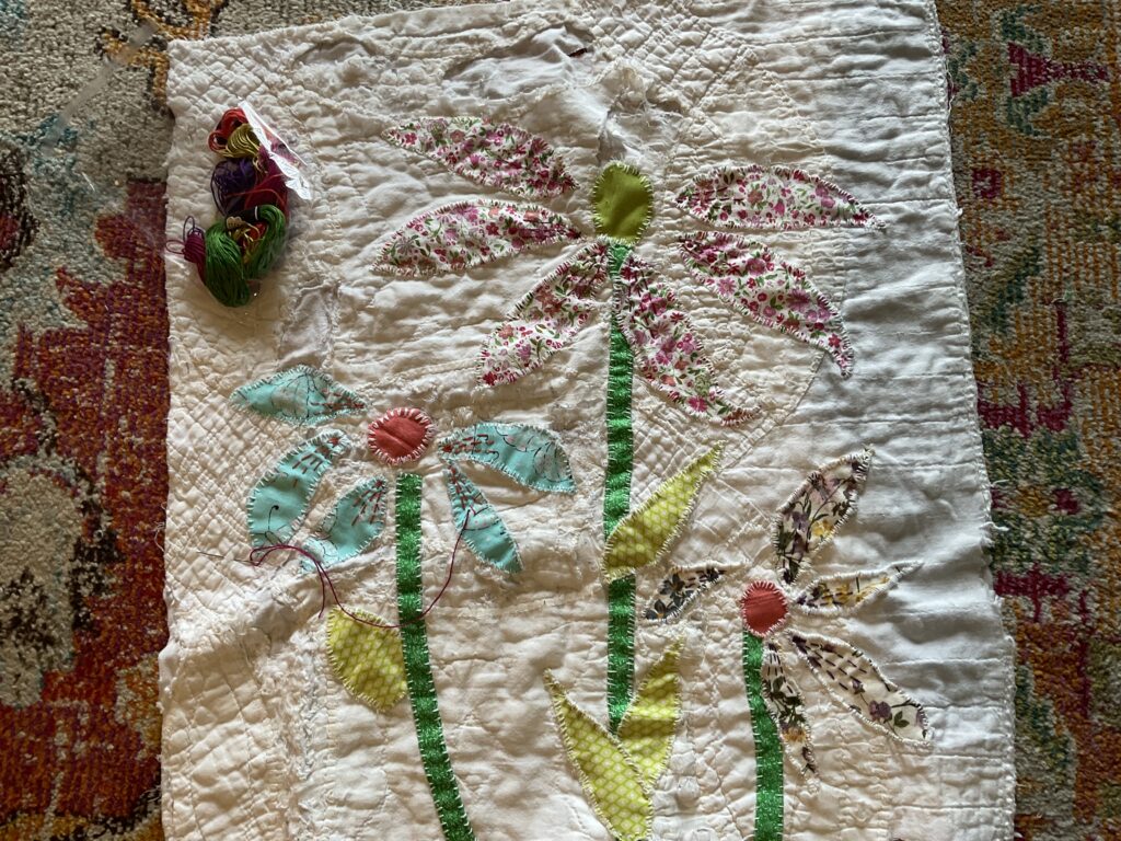 As a caregiver, I enjoy hand sewing and Marjory enjoys helping me pick fabric and embroidery floss colors.  We work together.